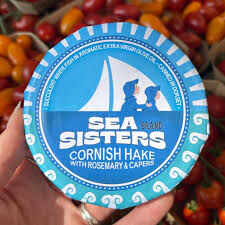 A round Sea Sisters tin of Cornish hake with rosemary and capers